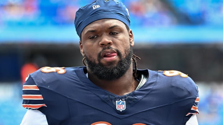 Zacch Pickens warms up before the Bears' win over Buffalo. Coach Matt Eberflus says his injury doesn't appear long term.