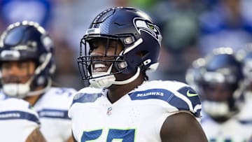 Dec 8, 2024; Glendale, Arizona, USA; Seattle Seahawks offensive tackle Charles Cross (67) against the Arizona Cardinals at State Farm Stadium. Mandatory Credit: Mark J. Rebilas-Imagn Images