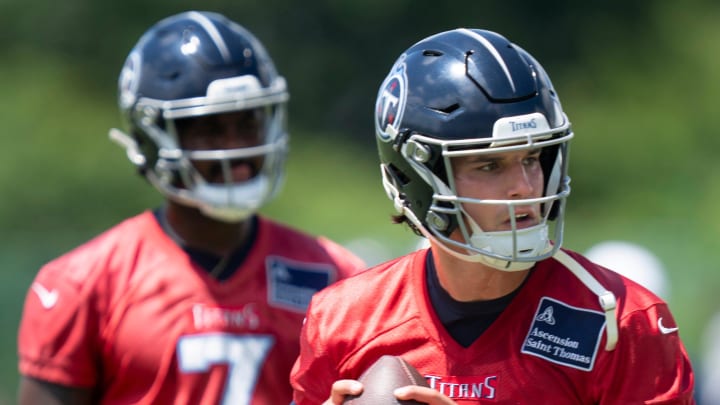 Quarterback Mason Rudolph (11)drops back to pass during the Tennessee Titans mandatory mini-camp at Ascension Saint Thomas Sports Park in Nashville, Tenn., Thursday, June 6, 2024.