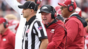 Oct 18, 2025; Fayetteville, Arkansas, USA; Arkansas Razorbacks interim head coach Bobby Petrino shouts toward a referee during the second quarter against the Texas A&M Aggies at Donald W. Reynolds Razorback Stadium. Mandatory Credit: Nelson Chenault-Imagn Images