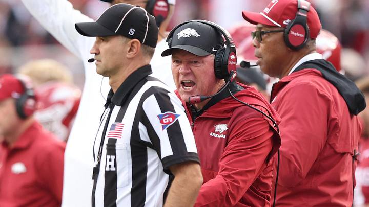Oct 18, 2025; Fayetteville, Arkansas, USA; Arkansas Razorbacks interim head coach Bobby Petrino shouts toward a referee during the second quarter against the Texas A&M Aggies at Donald W. Reynolds Razorback Stadium. Mandatory Credit: Nelson Chenault-Imagn Images