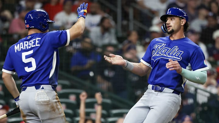Mar 10, 2026; Houston, TX, United States;  Italy center fielder Jakob Marsee (5) celebrates right fielder Jac Caglianone (14) run against the United States in the sixth inning at Daikin Park. Mandatory Credit: Thomas Shea-Imagn Images