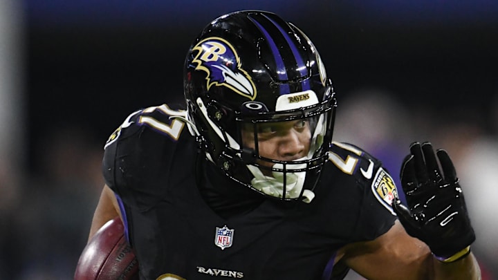 Jan 1, 2023; Baltimore, Maryland, USA; Baltimore Ravens running back J.K. Dobbins (27) rushes with the ball. Jan 1, 2023; Baltimore, Maryland, USA; Baltimore Ravens running back J.K. Dobbins (27) rushes with the ball.