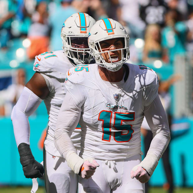 Miami Dolphins EDGE Jaelan Phillips celebrates after sacking Jacksonville Jaguars quarterback Trevor Lawrence.