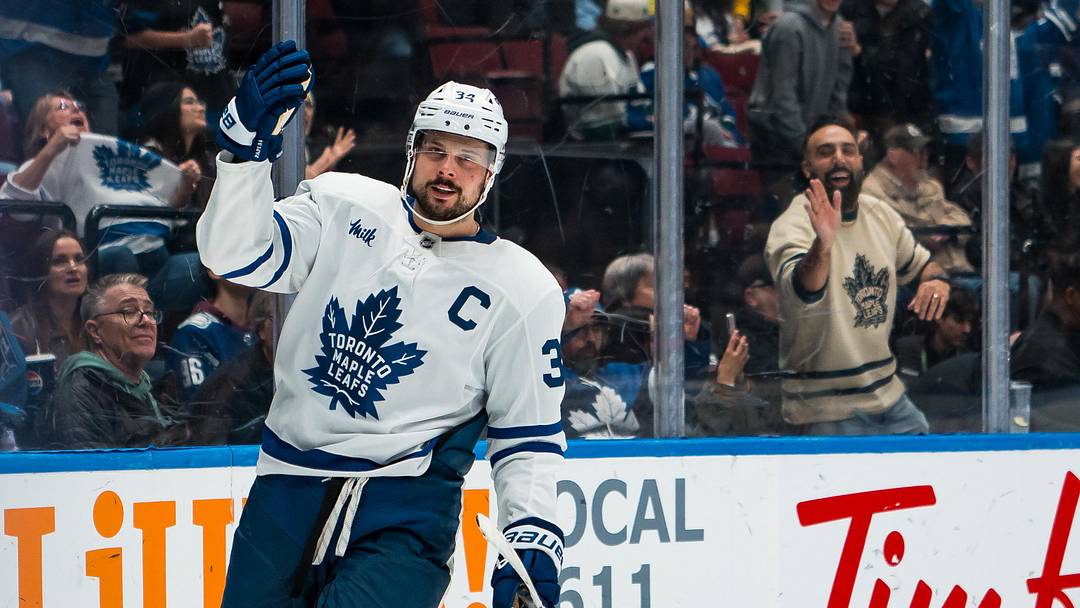 Jan 31, 2026; Vancouver, British Columbia, CAN; Toronto Maple Leafs forward Auston Matthews (34) celebrates his game winning shootout goal against the Vancouver Canucks at Rogers Arena. Mandatory Credit: Bob Frid-Imagn Images