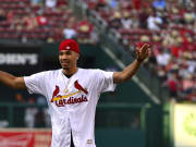 Jul 13, 2018; St. Louis, MO, USA; Boston Celtics forward Jayson Tatum (0) and St. Louis native celebrates after throwing out a first pitch prior to a game between the St. Louis Cardinals and the Cincinnati Reds at Busch Stadium.
