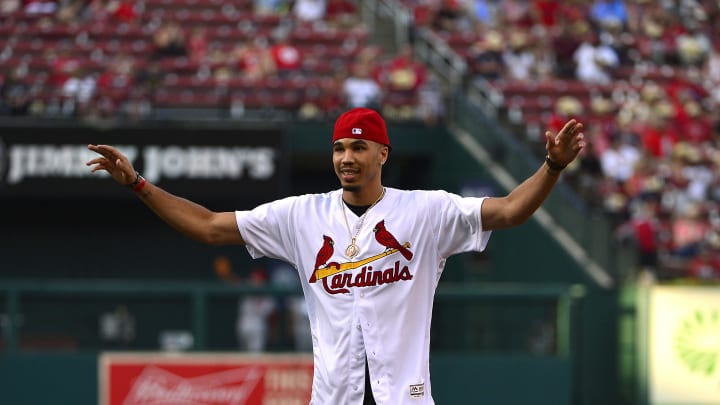 Jul 13, 2018; St. Louis, MO, USA; Boston Celtics forward Jayson Tatum (0) and St. Louis native celebrates after throwing out a first pitch prior to a game between the St. Louis Cardinals and the Cincinnati Reds at Busch Stadium.