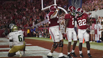 Sep 7, 2024; Tuscaloosa, Alabama, USA;  Alabama Crimson Tide running back Justice Haynes (22) celebrates with offensive lineman Parker Brailsford (72) and  wide receiver Ryan Williams (2) after scoring against the South Florida Bulls at Bryant-Denny Stadium. Alabama won 42-16. Mandatory Credit: Gary Cosby Jr.-Imagn Images