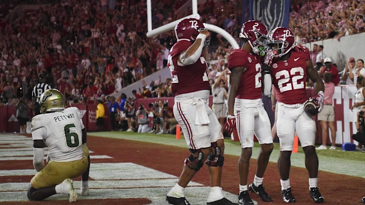 Sep 7, 2024; Tuscaloosa, Alabama, USA;  Alabama Crimson Tide running back Justice Haynes (22) celebrates with offensive lineman Parker Brailsford (72) and  wide receiver Ryan Williams (2) after scoring against the South Florida Bulls at Bryant-Denny Stadium. Alabama won 42-16. Mandatory Credit: Gary Cosby Jr.-Imagn Images