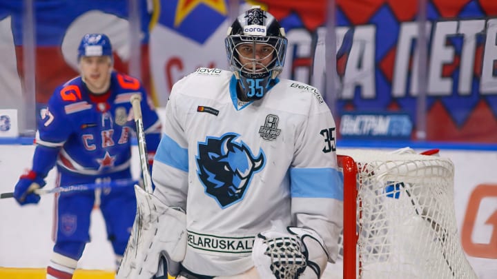 Dinamo Minsk Hockey Club player, Alexei Kolosov (No.35) in...