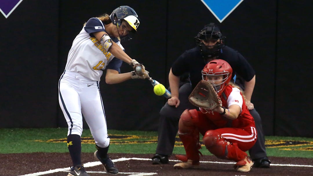 Michigan’s Jenissa Conway (13) swings at a pitch during the Big Ten softball tournament Friday, May 10, 2024 in Iowa City, Iowa.