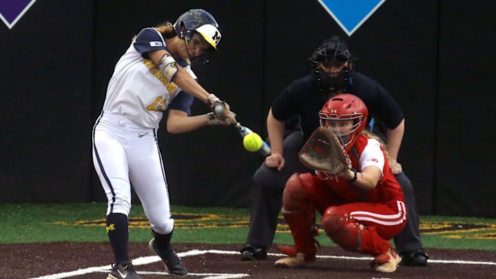 Michigan’s Jenissa Conway (13) swings at a pitch during the Big Ten softball tournament Friday, May 10, 2024 in Iowa City, Iowa.