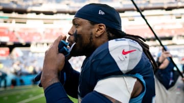 Tennessee Titans running back Derrick Henry (22) blows kisses to fans as he exits the field after defeating Jacksonville Jaguars 28-20 at Nissan Stadium in Nashville, Tenn., Sunday, Jan. 7, 2024.