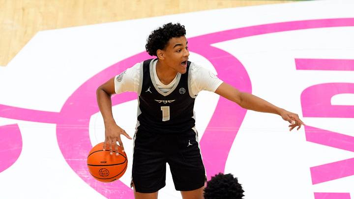 July 19, 2025; North Augusta, South Carolina, USA; Brad Beal Elite Quentin Coleman (1) gestures to a teammate as Team Durant Evans Barning Jr. (7) defends during the Brad Beal Elite and Team Durant game at the Nike EYBL Peach Jam at Riverview Park Activity Center. Brad Beal Elite won 91-59. Mandatory Credit: Katie Goodale - Augusta Chronicle/USA TODAY NETWORK