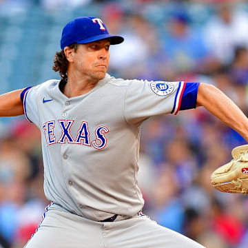 Jul 7, 2025; Anaheim, California, USA; Texas Rangers pitcher Jacob deGrom (48) throws against the Los Angeles Angels during the first inning at Angel Stadium. 