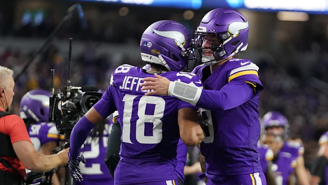 Dec 14, 2025; Arlington, Texas, USA; Minnesota Vikings wide receiver Justin Jefferson (18) celebrates with quarterback J.J. McCarthy (9) after a Vikings touchdown during the second half against the Dallas Cowboys at AT&T Stadium. Mandatory Credit: Raymond Carlin III-Imagn Images