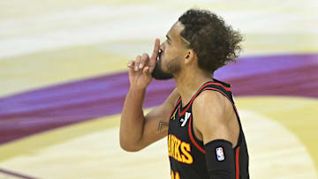 Atlanta Hawks guard Trae Young reacts after making a three-point basket in the fourth quarter against the Cleveland Cavaliers