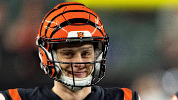 Cincinnati Bengals quarterback Joe Burrow (9) smiles while warming up with Cincinnati Bengals quarterback Brandon Allen (8) before an NFL wild-card playoff football game between the Baltimore Ravens and the Cincinnati Bengals, Sunday, Jan. 15, 2023, at Paycor Stadium in Cincinnati.

Baltimore Ravens At Cincinnati Bengals Afc Wild Card Jan 15 403