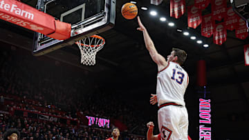 Feb 5, 2025; Piscataway, New Jersey, USA; Illinois Fighting Illini center Tomislav Ivisic (13) shoots the ball against the Rutgers Scarlet Knights during the first half at Jersey Mike's Arena. Mandatory Credit: Vincent Carchietta-Imagn Images