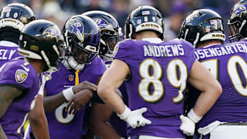 Dec 7, 2025; Baltimore, Maryland, USA; Baltimore Ravens quarterback Lamar Jackson (8) huddles with teammates before a play Pittsburgh Steelers during the second half at M&T Bank Stadium. Mandatory Credit: Mitch Stringer-Imagn Images