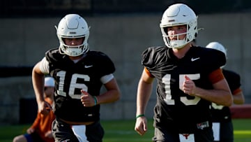 Arch Manning and Trey Owens during his first practice of the spring season on Tuesday, March 25, 2025.
