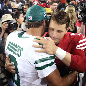 Sep 9, 2024; Santa Clara, California, USA; New York Jets quarterback Aaron Rodgers (8) greets San Francisco 49ers quarterback Brock Purdy (13) after a game at Levi's Stadium. Mandatory Credit: David Gonzales-Imagn Images