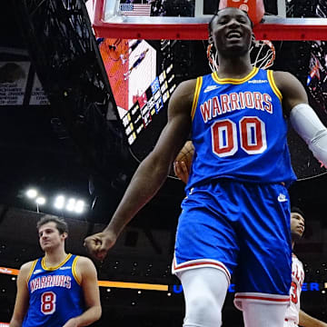 Jan 14, 2022; Chicago, Illinois, USA; Golden State Warriors forward Jonathan Kuminga (00) reacts after a defensive play against the Chicago Bulls during the second half at United Center. Mandatory Credit: David Banks-Imagn Images