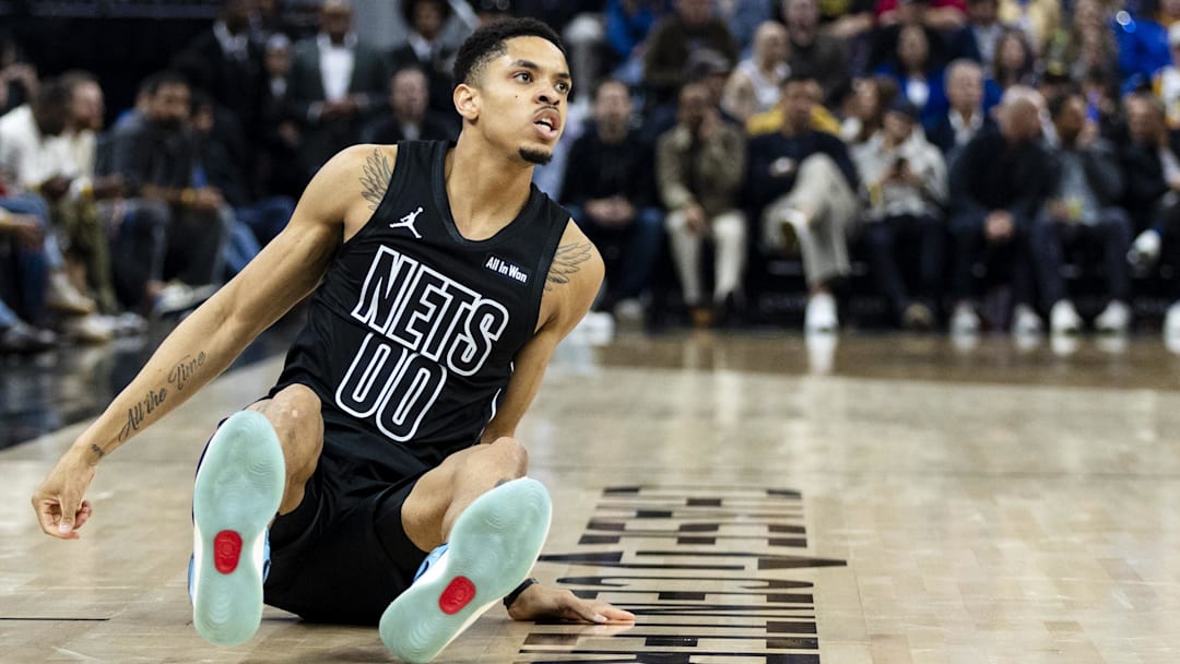Mar 25, 2026; San Francisco, California, USA; Brooklyn Nets forward Josh Minott (00) stumbles during the first quarter against the Golden State Warriors at Chase Center. Mandatory Credit: John Hefti-Imagn Images