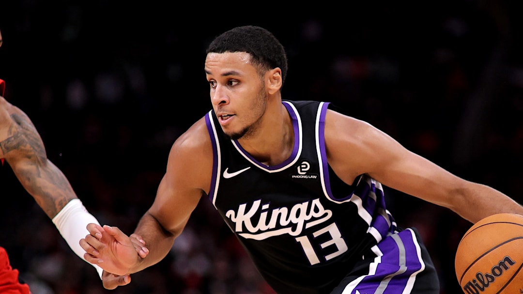 Dec 3, 2025; Houston, Texas, USA; Sacramento Kings forward Keegan Murray (13) drives to the basket against Houston Rockets forward Jabari Smith Jr. (10) during the third quarter at Toyota Center. Dec 3, 2025; Houston, Texas, USA; Sacramento Kings forward Keegan Murray (13) drives to the basket against Houston Rockets forward Jabari Smith Jr. (10) during the third quarter at Toyota Center.
