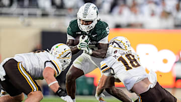 Michigan State running back Makhi Frazier (5) runs against Western Michigan safety Micah Davis (18) during the first half at Spartan Stadium in East Lansing on Friday, August 29, 2025.