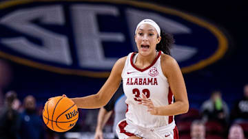 Mar 6, 2025; Greenville, SC, USA; Alabama Crimson Tide guard Aaliyah Nye (32) brings the ball up court during the second half against the Florida Gators at Bon Secours Wellness Arena. Mandatory Credit: Scott Kinser-Imagn Images