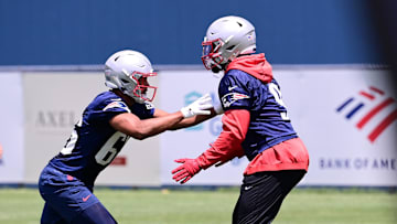 Jun 10, 2024; Foxborough, MA, USA; New England Patriots defensive end Jotham Russell (66) works with linebacker Matthew Judon (9) at minicamp at Gillette Stadium. Mandatory Credit: Eric Canha-USA TODAY Sports