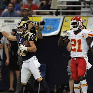 August 18, 2012; St. Louis, MO, USA; St. Louis Rams wide receiver Danny Amendola (16)  celebrates with wide receiver Steve Smith (12) after catching an 8 yard touchdown pass between his legs as Kansas City Chiefs cornerback Javier Arenas (21) looks on in the first half at the Edward Jones Dome. Mandatory Credit: Jeff Curry-Imagn Images