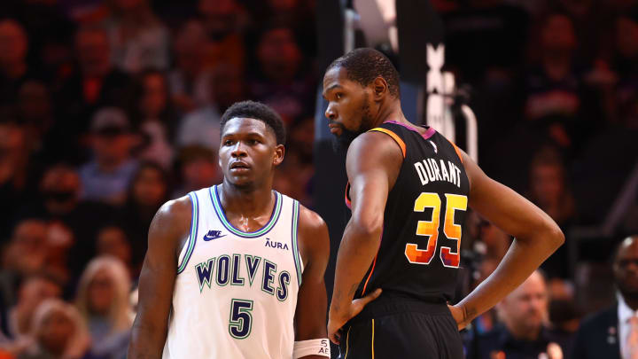 Nov 15, 2023; Phoenix, Arizona, USA; Minnesota Timberwolves guard Anthony Edwards (5) against Phoenix Suns forward Kevin Durant (35) at Footprint Center. Mandatory Credit: Mark J. Rebilas-USA TODAY Sports