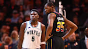 Nov 15, 2023; Phoenix, Arizona, USA; Minnesota Timberwolves guard Anthony Edwards (5) against Phoenix Suns forward Kevin Durant (35) at Footprint Center. Mandatory Credit: Mark J. Rebilas-Imagn Images