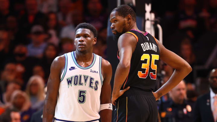 Nov 15, 2023; Phoenix, Arizona, USA; Minnesota Timberwolves guard Anthony Edwards (5) against Phoenix Suns forward Kevin Durant (35) at Footprint Center. Mandatory Credit: Mark J. Rebilas-USA TODAY Sports