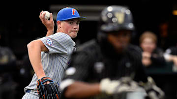 Florida pitcher Hunter Barco, left, throws out Vanderbilt   s Enrique Bradfield Jr. (51) at first base during the second inning of an NCAA college baseball game Friday, April 15, 2022, in Nashville, Tenn.

Nas Vanderbilt Vs Florida Baseball 011