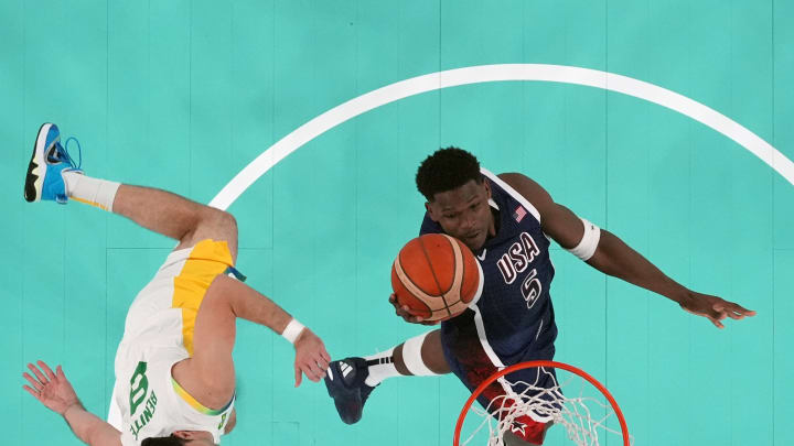 United States guard Anthony Edwards (5) shoots against Brazil shooting guard Vitor Benite (8) in the first half in a men’s basketball quarterfinal game at the Paris Olympics at Accor Arena in Paris on Aug. 6, 2024.