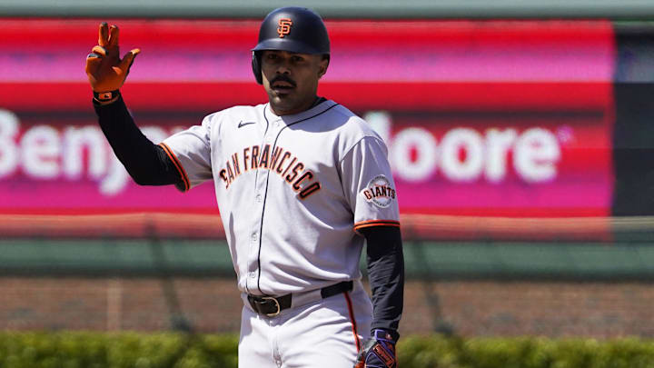 May 7, 2025; Chicago, Illinois, USA; San Francisco Giants first base LaMonte Wade Jr. (31) gestures after hittin a one run double against the Chicago Cubs during the fourth inning at Wrigley Field. Mandatory Credit: David Banks-Imagn Images