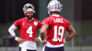 Jun 4, 2024; Frisco, TX, USA; Dallas Cowboys quarterback Dak Prescott (4) and quarterback Trey Lance (19) stand on the field during practice at the Ford Center at the Star Training Facility in Frisco, Texas. Mandatory Credit: Tim Heitman-USA TODAY Sports