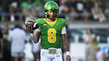 Sep 7, 2024; Eugene, Oregon, USA; Oregon Ducks quarterback Dillon Gabriel (8) warms up before a game against the Boise State Broncos at Autzen Stadium. Mandatory Credit: Troy Wayrynen-Imagn Images