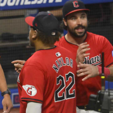 Jul 24, 2024; Cleveland, Ohio, USA; Cleveland Guardians manager Stephen Vogt (12) celebrates with first baseman Josh Naylor (22) after a win over the Detroit Tigers at Progressive Field. Mandatory Credit: David Richard-USA TODAY Sports