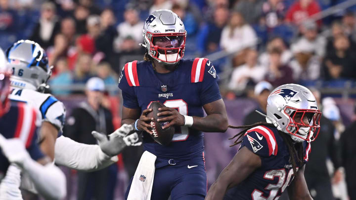 August 8, 2024; Foxborough, MA, USA;  New England Patriots quarterback Joe Milton III (19) looks to throw a pass against the Carolina Panthers during the second half at Gillette Stadium. Mandatory Credit: Eric Canha-USA TODAY Sports