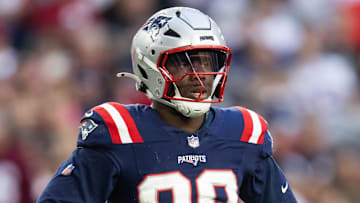 Dec 15, 2024; Glendale, Arizona, USA; New England Patriots defensive end Keion White (99) against the Arizona Cardinals at State Farm Stadium. Mandatory Credit: Mark J. Rebilas-Imagn Images