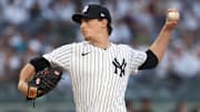 May 2, 2025; Bronx, New York, USA; New York Yankees starting pitcher Max Fried (54) delivers a pitch during the first inning against the Tampa Bay Rays during the first inning at Yankee Stadium.