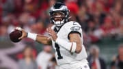 Jan 15, 2024; Tampa, Florida, USA; Philadelphia Eagles quarterback Jalen Hurts (1) throws against the Tampa Bay Buccaneers during the first half of a 2024 NFC wild card game at Raymond James Stadium. Mandatory Credit: Nathan Ray Seebeck-USA TODAY Sports