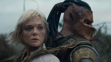 (L-R) Thia (Elle Fanning) and Dek (Dimitrius Schuster-Koloamatangi) in 20th Century Studios' PREDATOR: BADLANDS film.