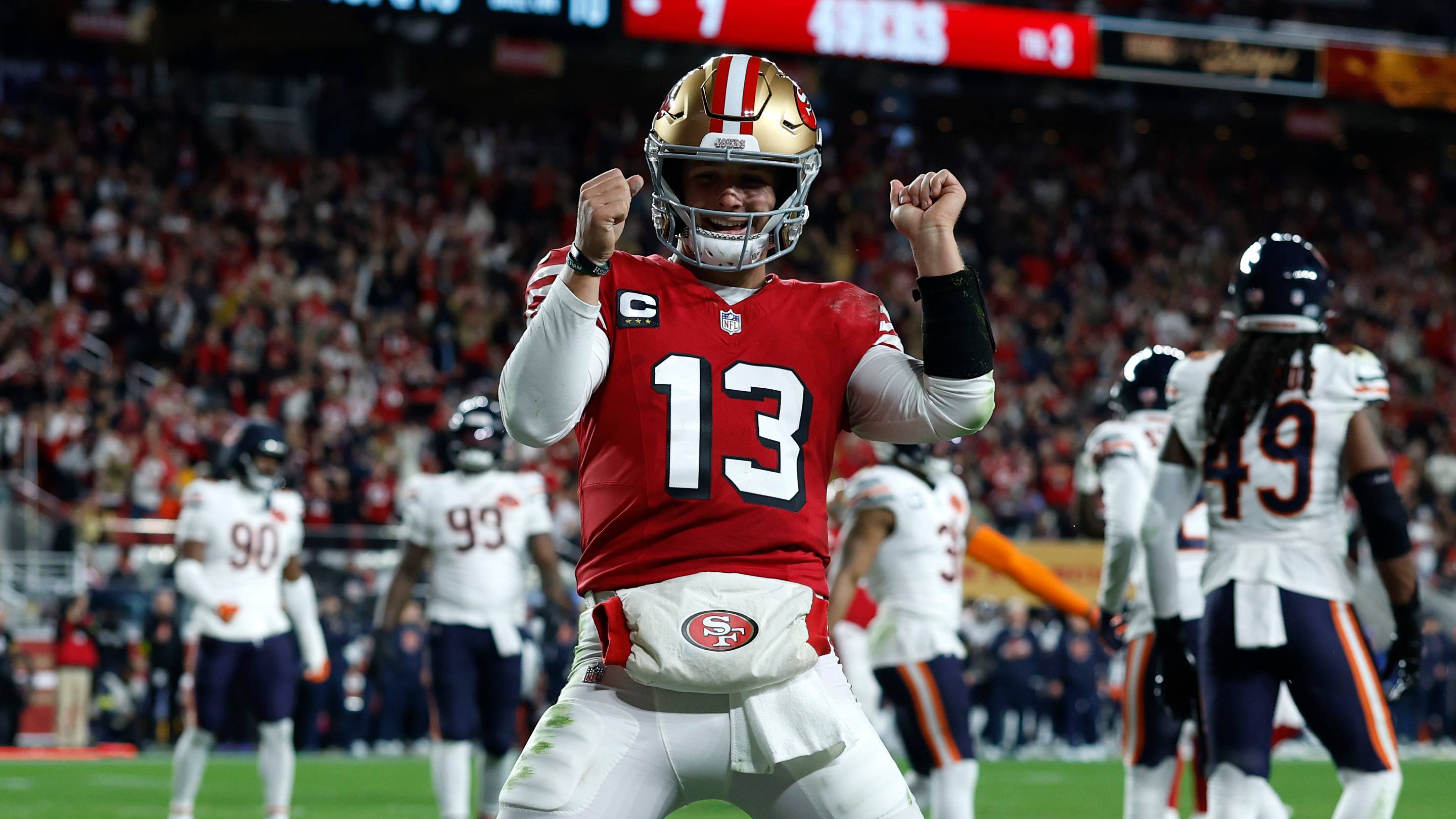 Dec 28, 2025; Santa Clara, California, USA; San Francisco 49ers quarterback Brock Purdy (13) celebrates after scoring a touchdown against the Chicago Bears in the first half at Levi's Stadium. Mandatory Credit: Sergio Estrada-Imagn Images