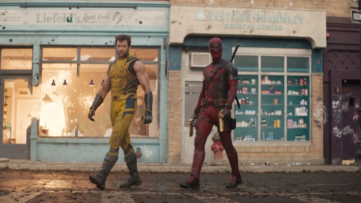 (L-R): Hugh Jackman as Wolverine/Logan and Ryan Reynolds as Deadpool/Wade Wilson in 20th Century Studios/Marvel Studios' DEADPOOL & WOLVERINE. Photo courtesy of 20th Century Studios/Marvel Studios. © 2024 20th Century Studios / © and ™ 2024 MARVEL.