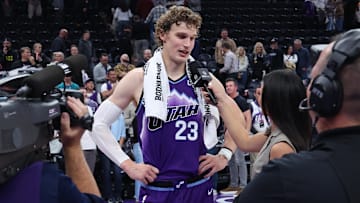 Oct 27, 2025; Salt Lake City, Utah, USA; Utah Jazz forward Lauri Markkanen (23) is interviewed after the game by media after scoring 51 points in the game against the Phoenix Suns at Delta Center. Mandatory Credit: Rob Gray-Imagn Images